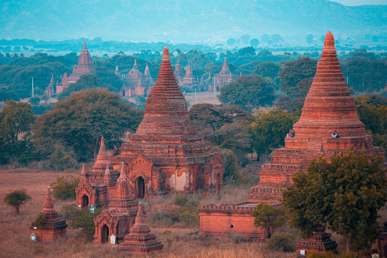 Red-brick temples and stupas rising from the trees of the Bagan plain
