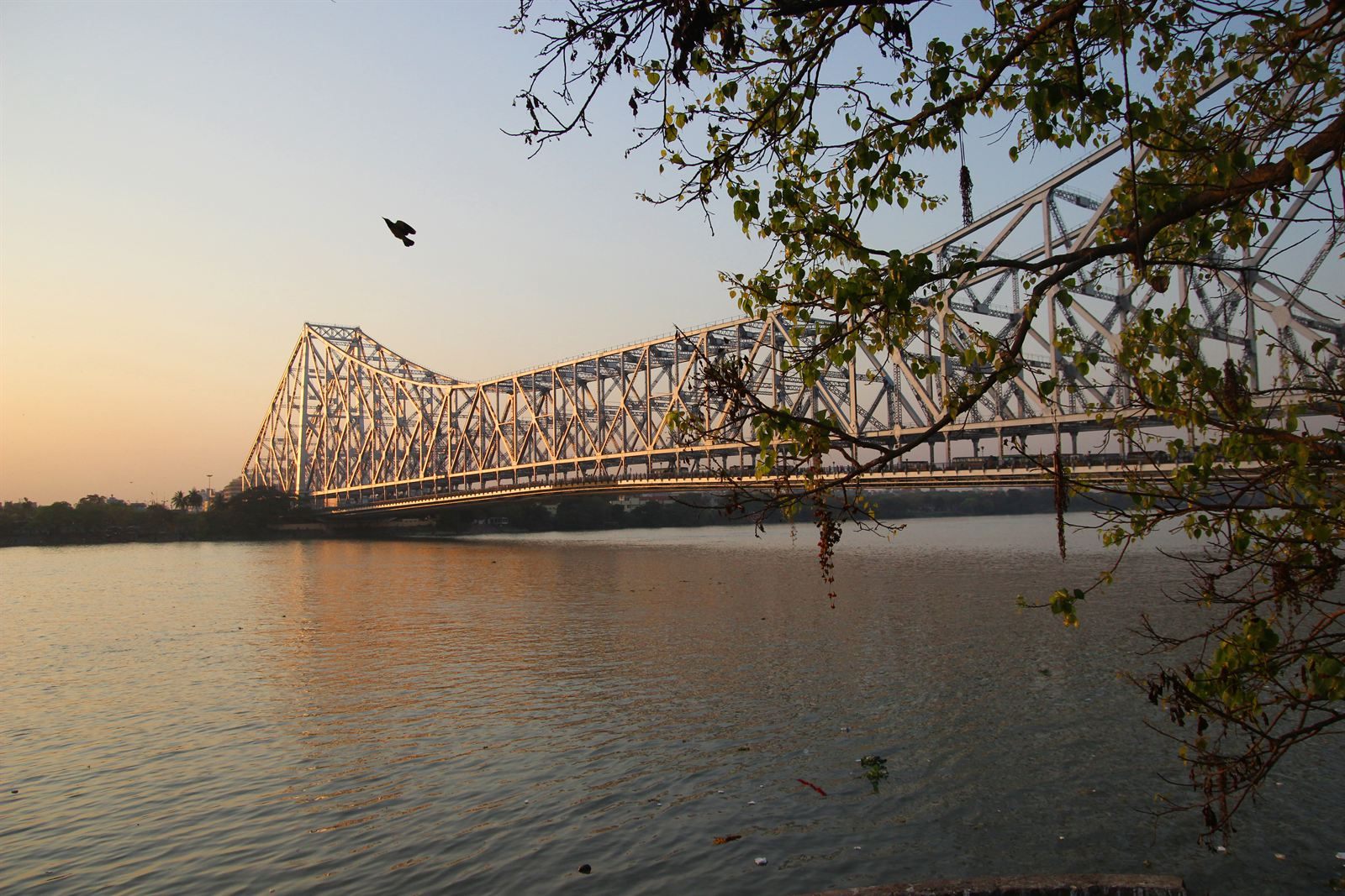 Howrah Bridge over the Hooghly River in Kolkata at dusk